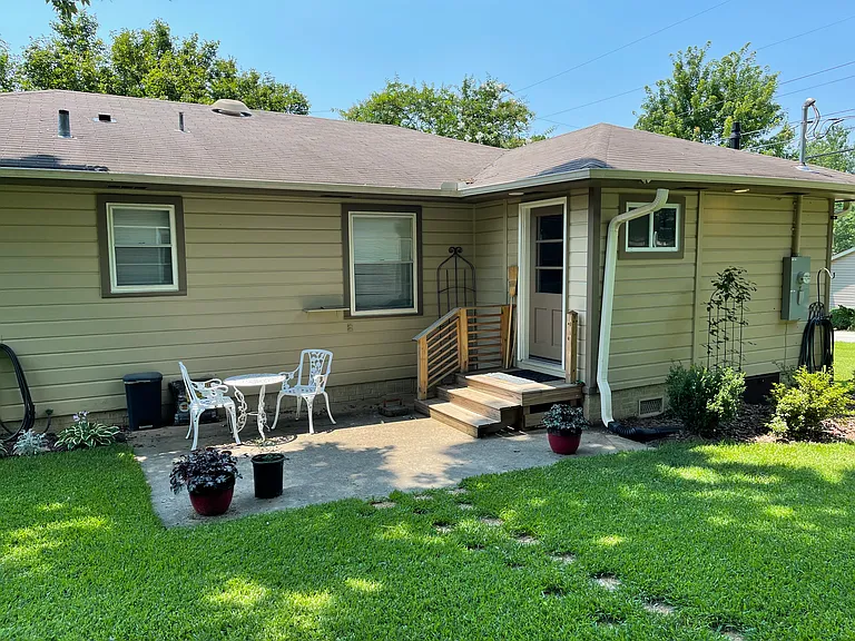 Morning sun bathes this cozy patio. Afternoons are shady. The front porch provides a sunny afternoon spot. Privacy fence shields from very nice neighbors to the south. They are very long term residents as are the neighbors across both streets.