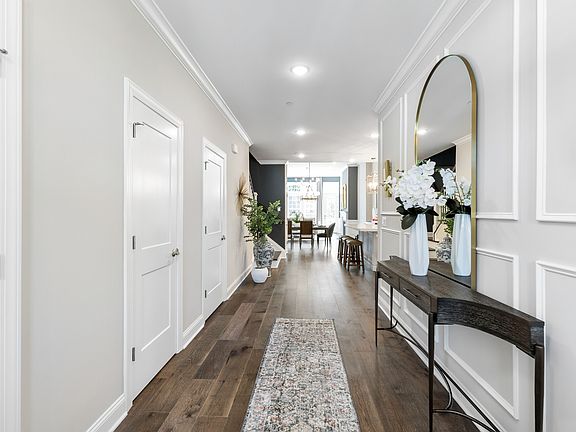 Welcoming foyer with decorative wall feature