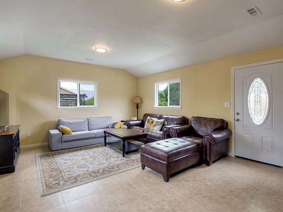 Spacious sun room - the door to the back yard