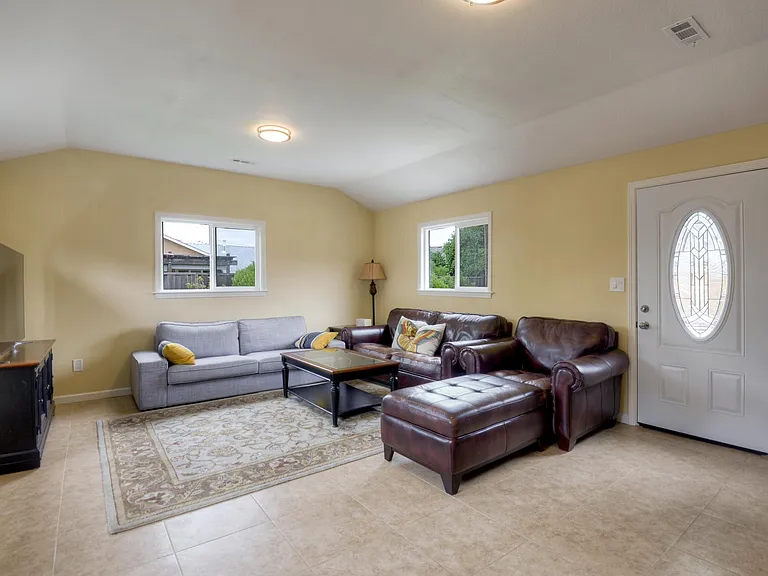 Spacious sun room - the door to the back yard