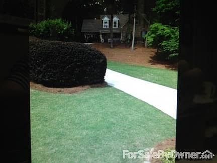 Great lawn areas in front of home.