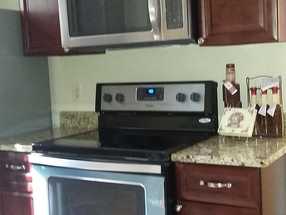 Stainless steel appliances, granite countertops