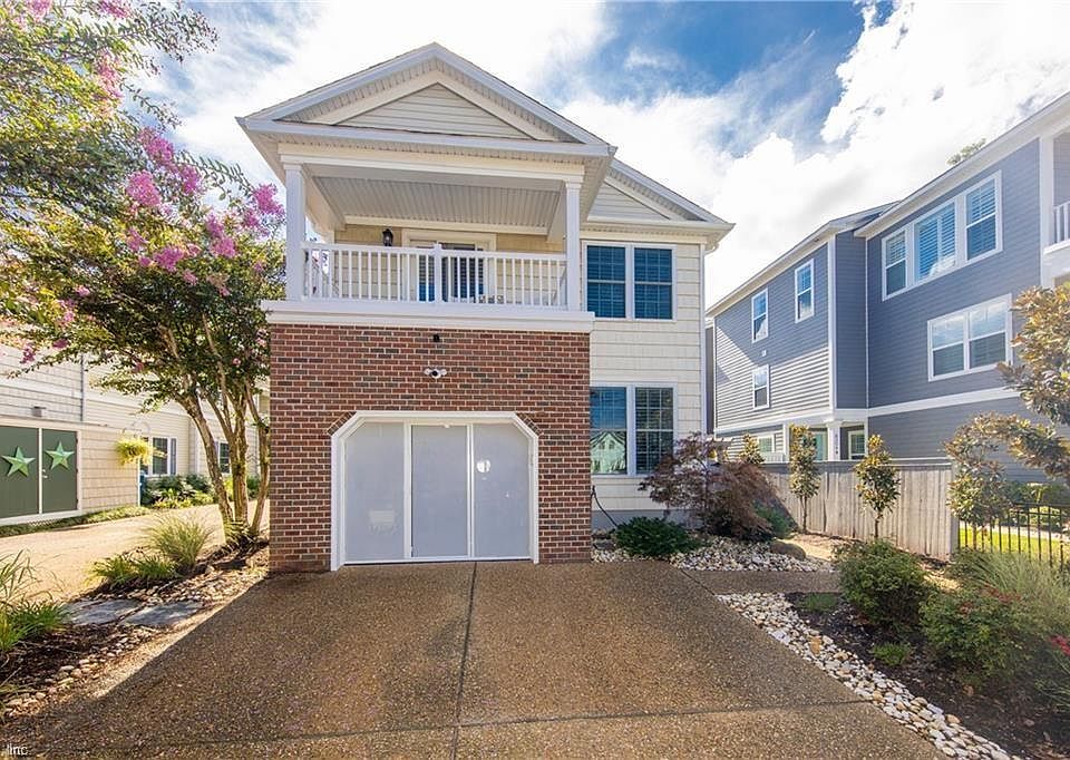 Street view with parking for two, two landscaping visits included in rent to keep the property looking great all year long.