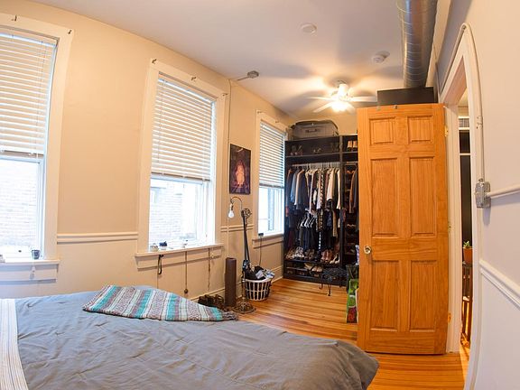 The bedroom, facing north. This adjoins the alley between At