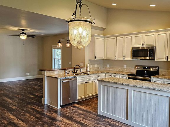 Great Room - Dining looking to Kitchen and Living