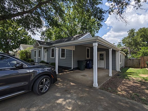 Carport door leads to primary bedroom.