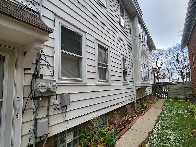 Back/side door view to front of house.