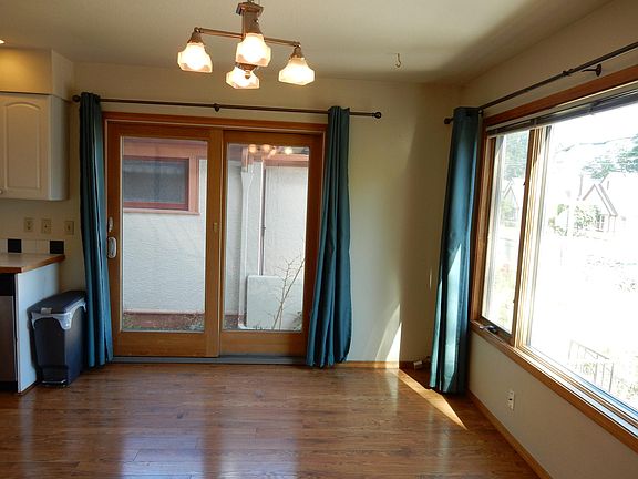 Dining room with patio doors & large picture window