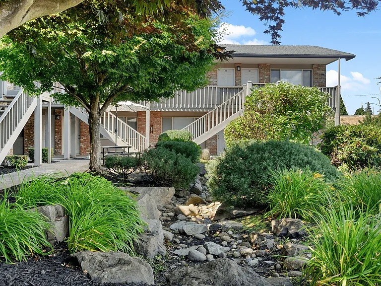 Beautifully landscaped courtyard with serene rock garden.