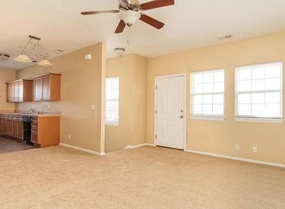 View from the living room towards dining and kitchen.