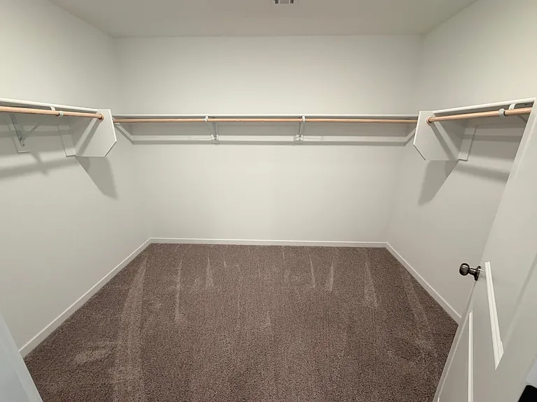Located off the master bath. This walk in closet is huge!