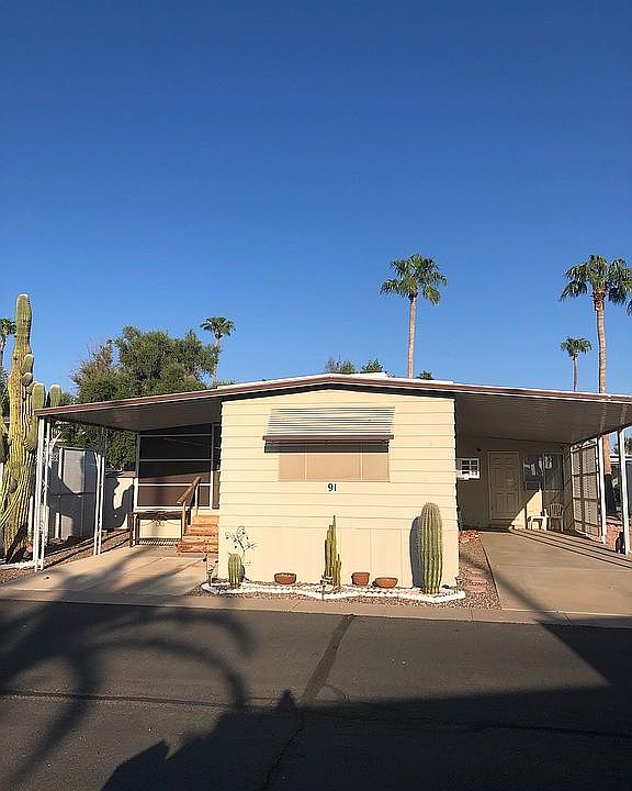 Front with 2 covered drives