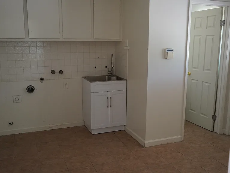 Laundry room and a half bathroom