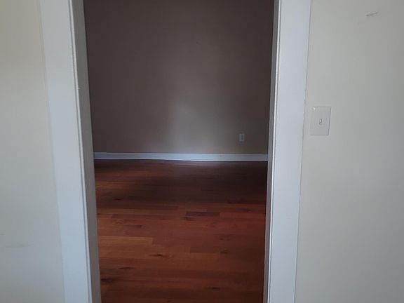 Walking from kitchen into dining room.