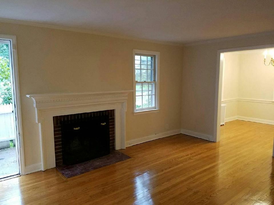 Living room with wood-burning fireplace