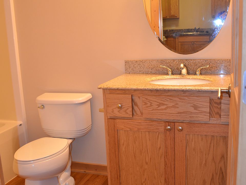 bathroom with granite countertop
