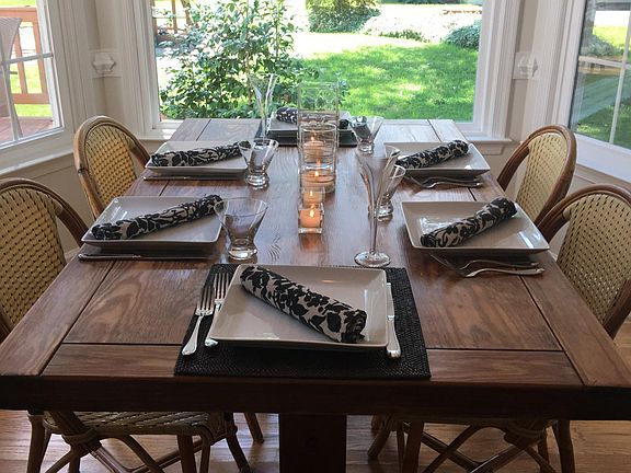 Dining in kitchen overlooking 3 acres and barn