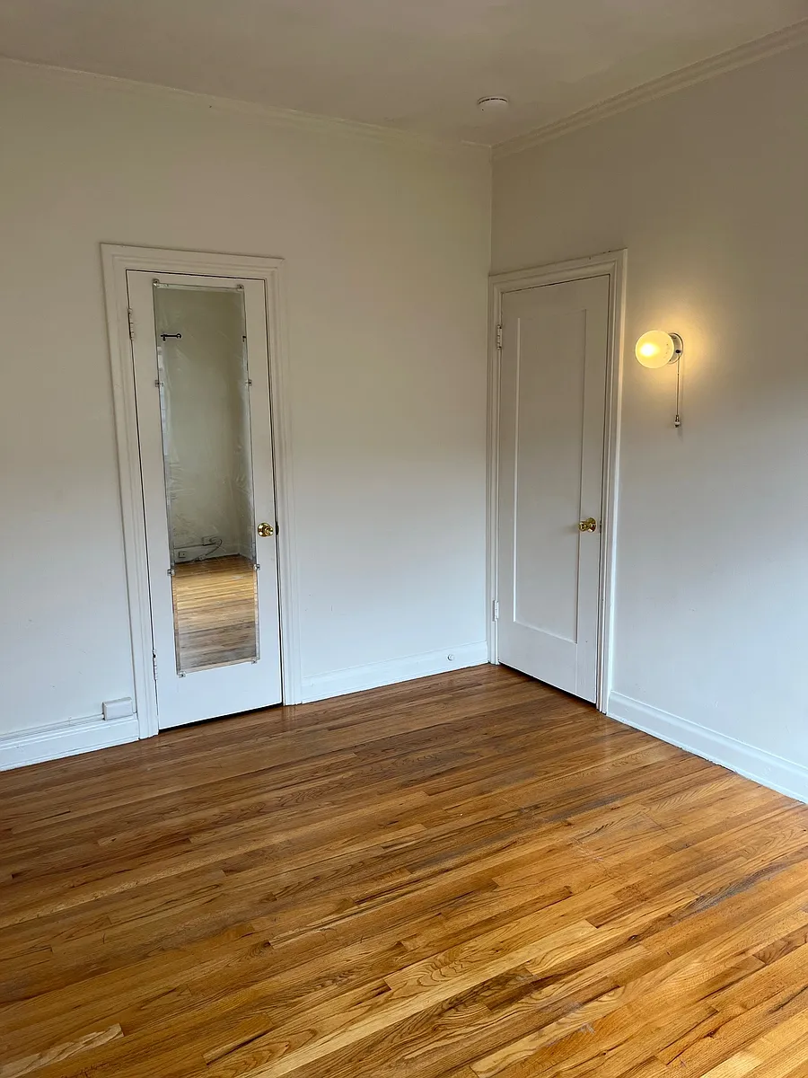 Bedroom with large closet - 222 N Chevy Chase Dr #5