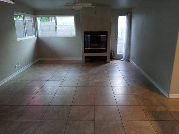 Living Rm to fireplace, new blinds