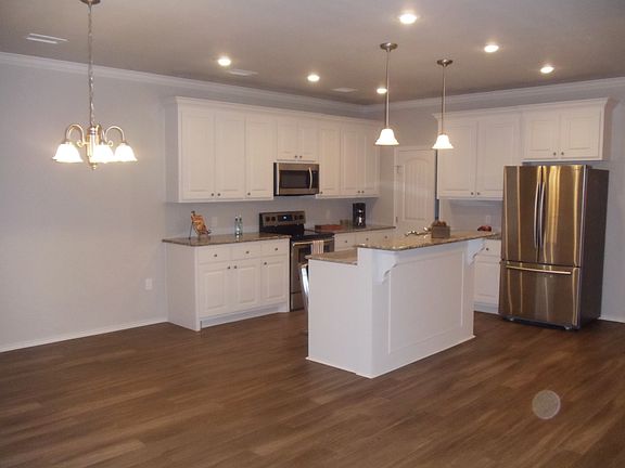 Dining Area Open to Kitchen & Living