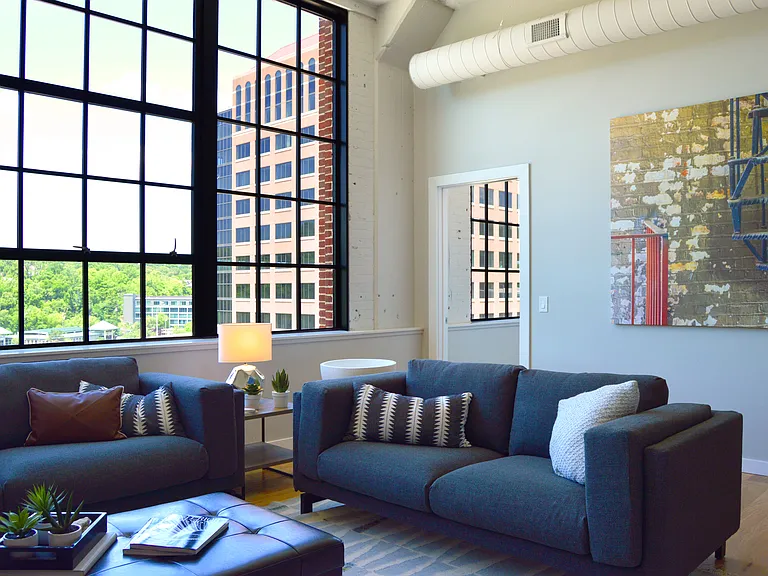Living area featuring large windows