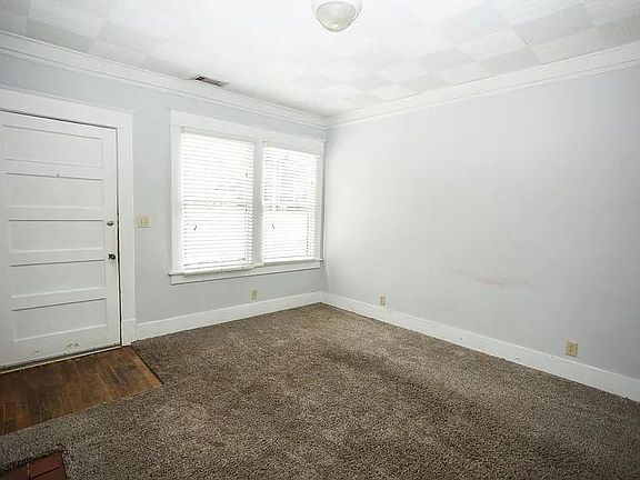 Living Room w/ Faux Fireplace