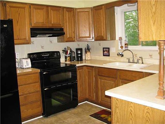 Kitchen With Newer Appliances & Flooring