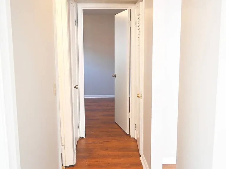Hallway in a unit at Benson Crest Apartments.