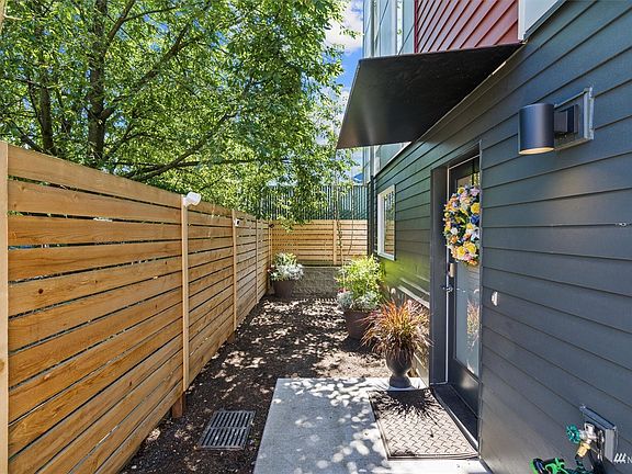 Entry to home. Fully fenced front & side yard areas. Plenty of space to put a BBQ, let the pets play or set up a relaxing sitting area.>