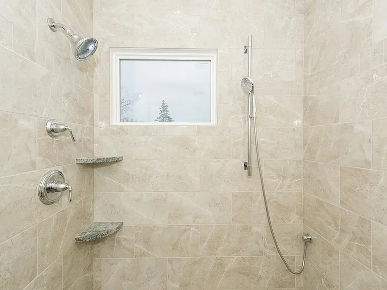 Kohler Shower head and hand held with Granite Shelving