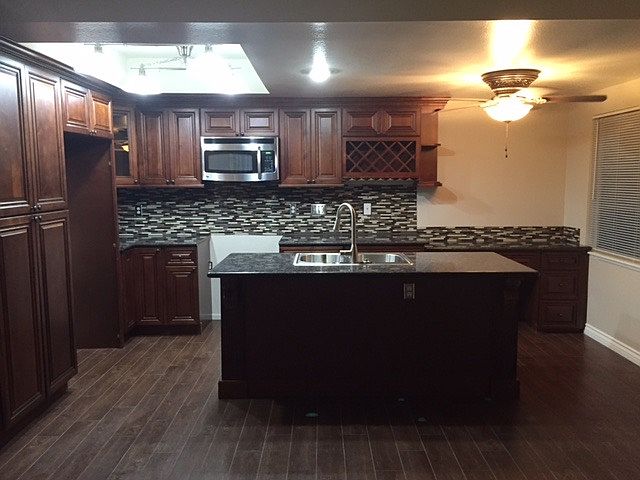 kitchen island and computer desk area