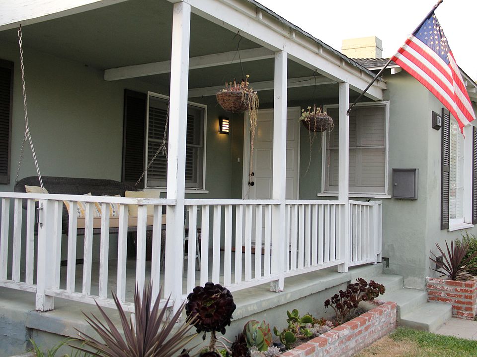 Front porch with porch swing! Gets the best morning sun.