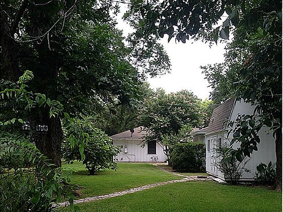 Property backs up to a greenbelt along Brickhouse Gully with plenty of space to add on or to build a