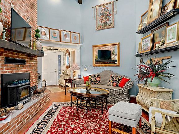 Living room W/ wood burning fire place