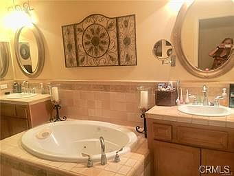 Primary Bathroom with jetted tub, separate shower, & double sinks