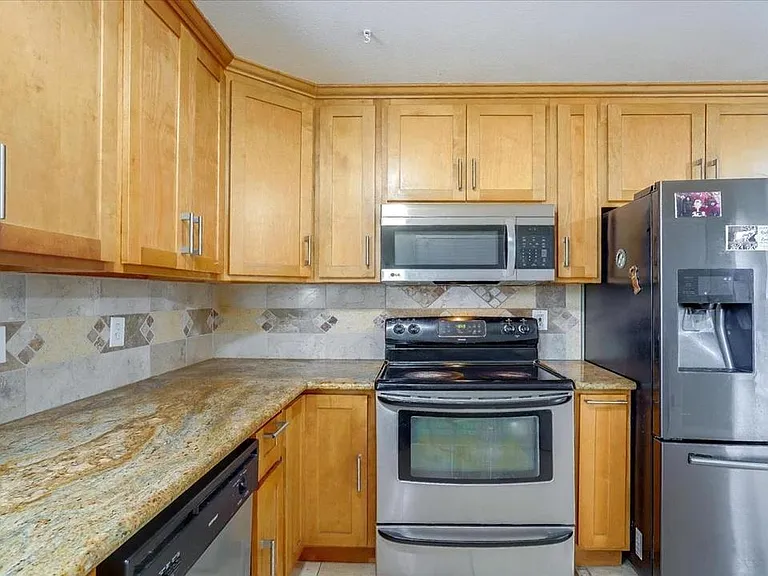 Main kitchen with granite countertop