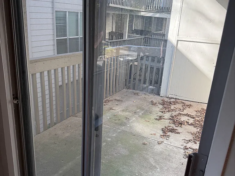 Spacious 2nd Floor Patio with access from both living room and bedroom.