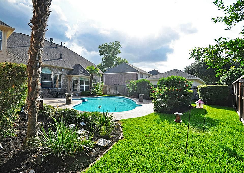 Impressive even from the back! Whether you like to entertain or not, this home is a dream come true! It is absolutely ready for move in.