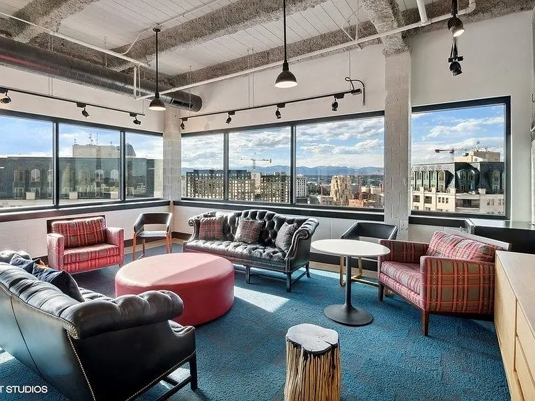 Penthouse entertainment lounge with comfortable seating at Archer Tower in Denver, CO
