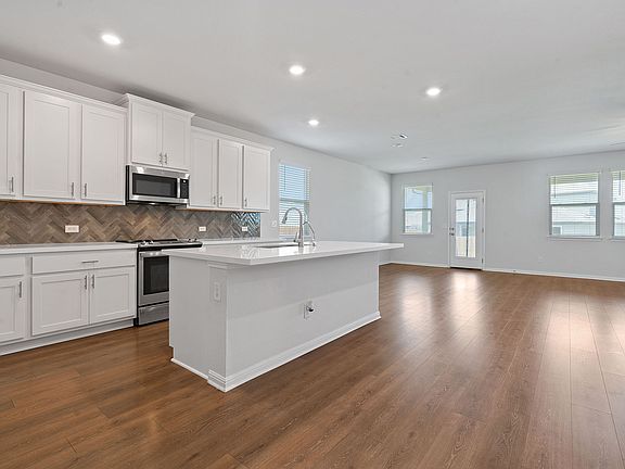 Kitchen (First Floor): Quartz countertops and modern soft-close cabinets, A perfect space for cooking and entertaining. LG Instaview Refrigerator WI-FI.