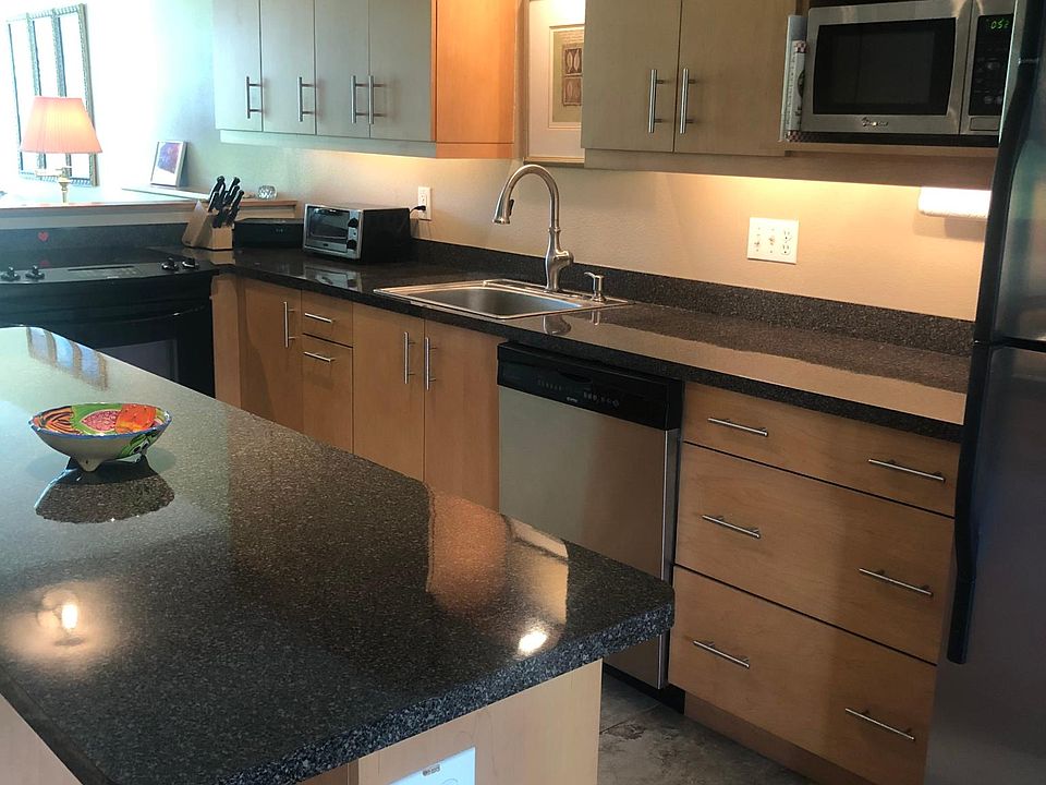 Brookhaven Maple Designer Cabinets throughout including Island with large custom drawers.