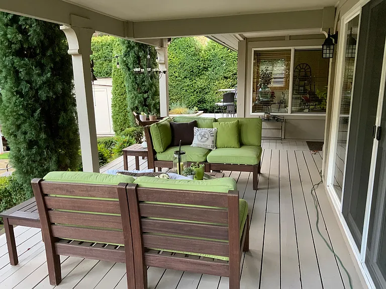 Covered porch off the living room/kitchen