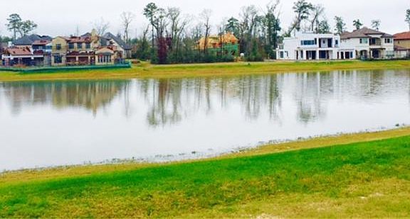 VIEW FROM ACROSS THE LAKE TO THE LOT