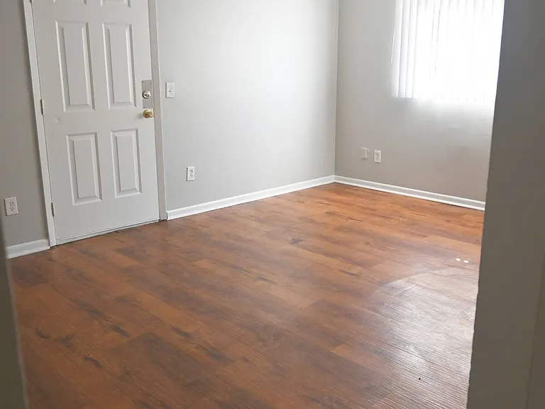 Large modern living room at Benson Crest Apartments.