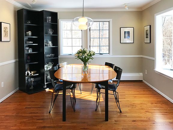 Dining room with chair railing and lovely views