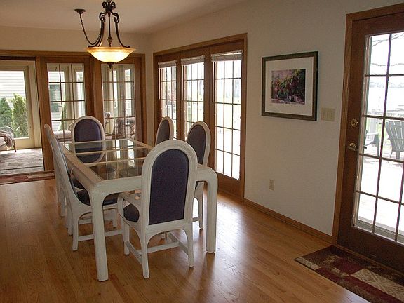 Dining area with beautiful lakeviews and hardwood floor