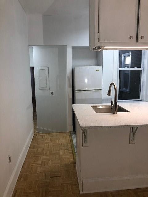 Looking west from living room to kitchen
