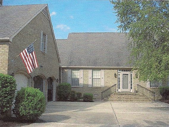 Driveway 3 car garage.