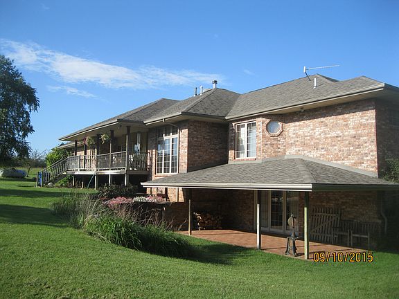 Covered brick patio on back