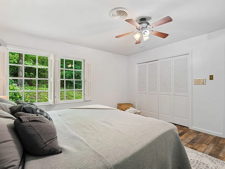 Secondary perspective of bedroom 2, with windows facing back lawn